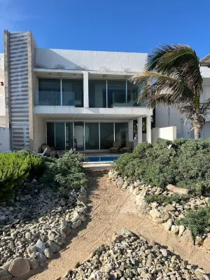 Stunning oceanfront 3-bedroom, 3.5 bath house in Isla Mujeres Hotels near Dolphin Discovery Isla Mujeres
