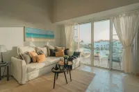 COZIEST 2 BEDROOM LOFT WITH PRIVATE BEACH AT CAP CANA