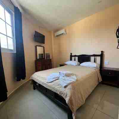 La Cubana Hotel & Residencial Rooms