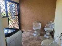 Spacious 2-bedroom apartment in Mandeville with hot tub ,WiFi and private garage