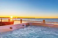 6BR Houghton Lake House w/ Indoor Pool, Hot Tub, and Golf Simulator - Sleeps 24