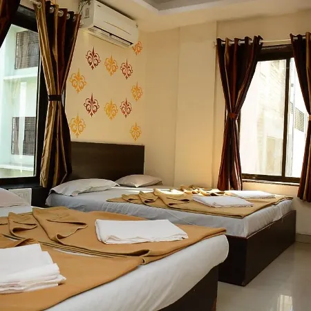 Hotel Sai Sampada NX Отели рядом с достопримечательностью «Храм Саи Бабы»
