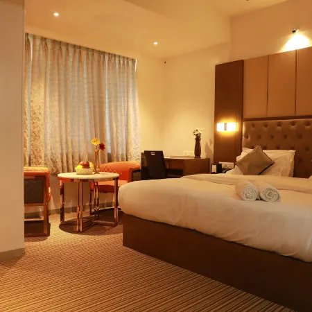 Krishna Residency (A Business Budget Hotel) Отели рядом с достопримечательностью «Стадион Balewadi»