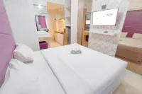 Purple Touch Studio at Orchard Supermall Mansion Apartment By Travelio