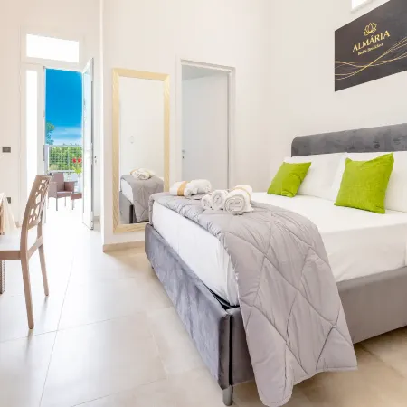Monolocale Riva – Wi-Fi, Clima e Giardino a Torre Lapillo