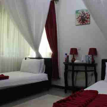 Signature Hotel Apartments Rooms