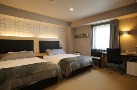 綠瑞飯店&膠囊那霸-人工溫泉雙股湯花