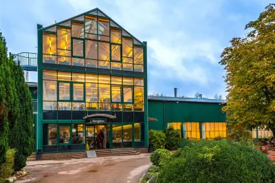 Scheck Hotel Hôtels à : Unterfohring