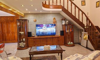 Xiegang Zhuangnian Apartment (Huapujie Branch)