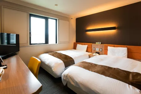 Kagoshima Plaza Hotel Tenmonkan Отели рядом с достопримечательностью «Shiroyama Park Observation Deck»