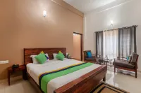 Treebo Vrindavan, 3 Km from Madikeri Fort Hotels in Kandanakolli