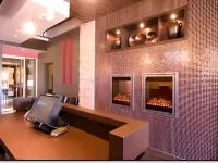 Woodlands Inn & Suites