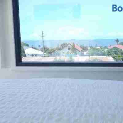 The Sky House by the Bay Rooms