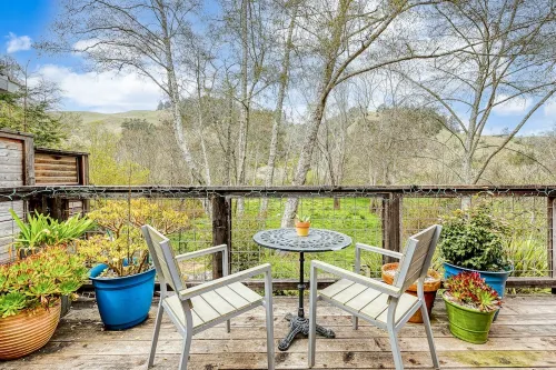 Riverfront cottage w/ hot tub, lush gardens, privacy & river access, pets ok!