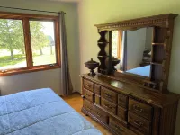 Charming farmhouse upper floor with 2 bedrooms and WiFi, AC in Warroad