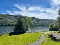 WATERSIDE 3 BED COTTAGE, HOT TUB, SAUNA, PVT BEACH