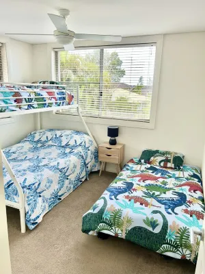 Cosy unit with delightful park and water views. Perfect for a family holiday!