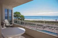 Luxurious 2nd floor beachfront condo w wrap-around balcony @ The Enclave - 2 ดาว