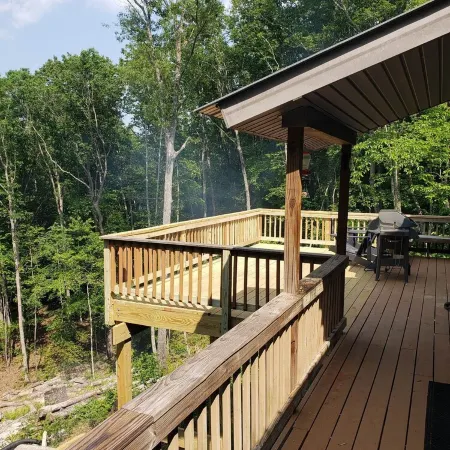 Cozy cool cabin in the mountains with a view Close to Downtown with a hot tub