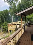 Cozy cool cabin in the mountains with a view Close to Downtown with a hot tub