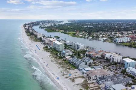 Waterfront views - steps from the Beach!