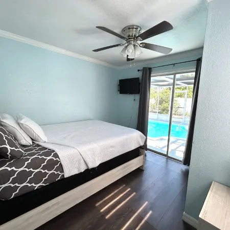 Quiet Pool Haven: 4BR - 9PPL, AC, WiFi, and Beaches Nearby