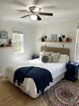Cozy coastal oasis w/ wooded views and wrap around deck. Close to Dauphin Island