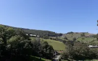 Renovated farmhouse in a hamlet in the Monts du Lyonnais region, close to the town centre.