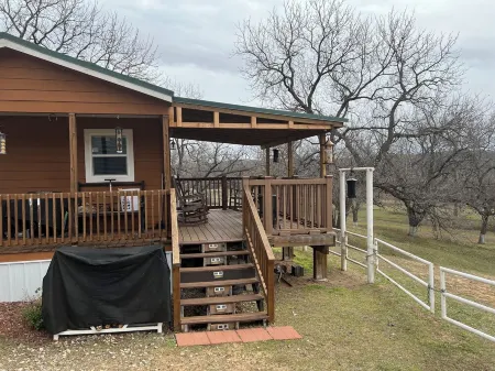 Ben Ranch Cabin # 2 located in a century old Pecan Orchard. 2 Bedroom plus couch