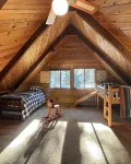 Wooden A-Frame Cabin Nestled in the Tall Pines