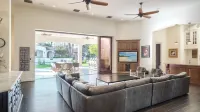 Spacious Palm-Lined Villa with Pool, Sport Court & Outdoor Living