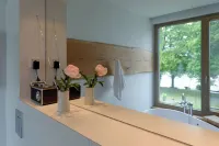 House on the Havelbogen directly on the water with canoe and jetty, terrace apartment