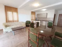 An apartment in a complex in a pine forest