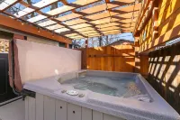 Private Hot Tub and Outdoor Entertainment Space - Charming Oasis