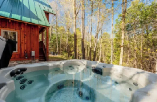 Secluded cabin on Betsie River with hot tub & firepit. Minutes to Crystal Mtn