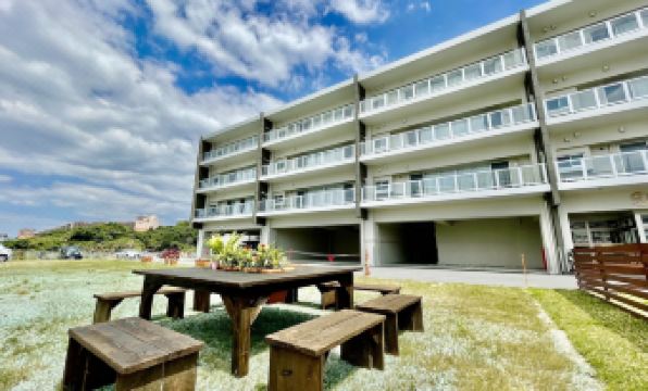 Coral Palace Onna by Sunset Avenue