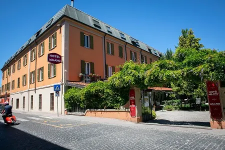 Hotel Milano Pool & Garden Отели в г. Кодевилла