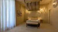 Palazzo Russo Suite & Apartments