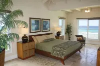 OCEANFRONT LUXURY VILLA, 4900sf, 4br, 4bth, billiards and Gym Hotel a 