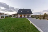 Modern house CORNELLO with garden next to lagoon Hotels in Gmina Wolin