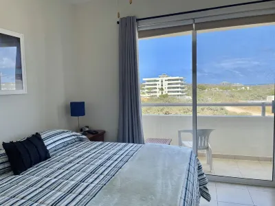 King Bed 2/2 Condo - Newly Furnished - Walk to Beach