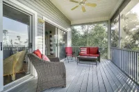 Book your getaway now! Relax on the screened porch looking out over the Bay!