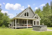 Large chalet, hot tub, fire pit, grill, ping pong. Ski, bike, hike out the door!