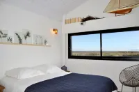 Wooden villa facing the sea