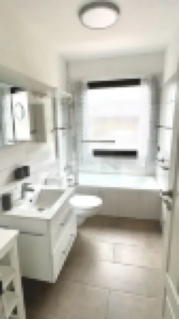 Sunny side apartment - central, flooded with light, quiet location, carport