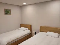 Zamong Hotel Hotels near Hallim Stadium