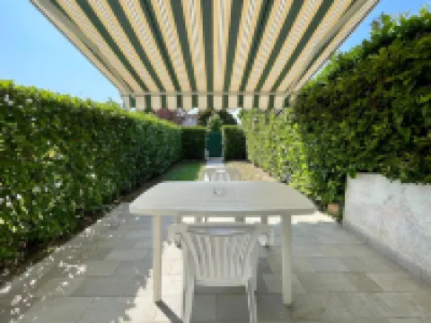 Casa a schiera con giardino privato