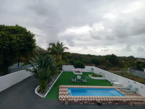 Villa Bella is 5 Mins from the Beach with Amazing Garden Overlooking the Pool - Homestays