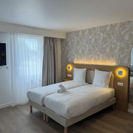 Brit Hotel Confort Roissy Saint-Witz