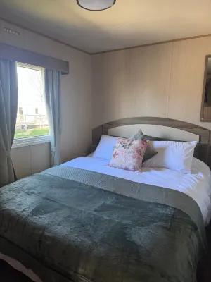 Cozy Caravan at Tower Lawn, Haggerston Castle Perfect Family Getaway - 2-Star